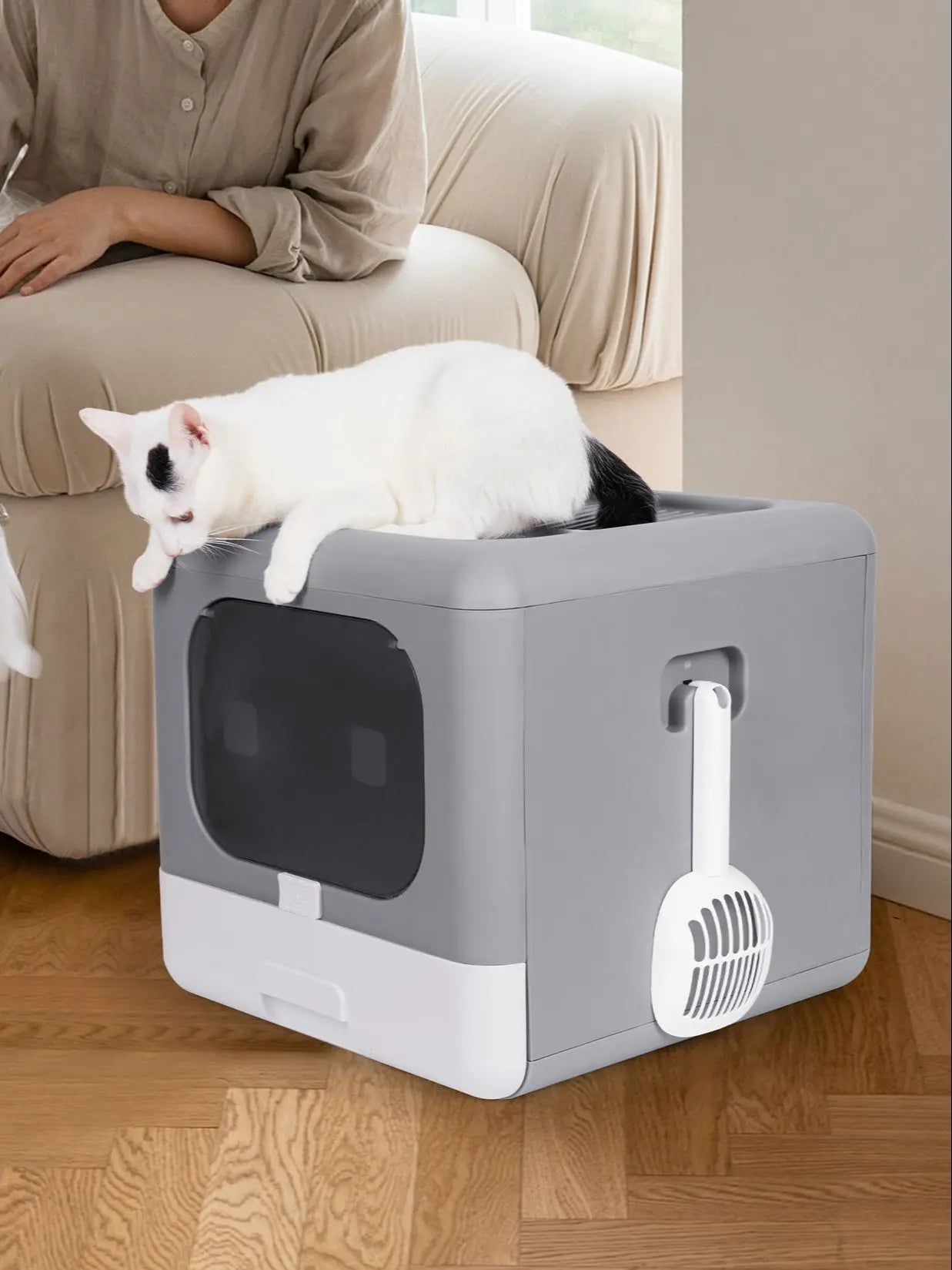 Bac à litière pliable pour chat avec couvercle et entrée avant, montrant sa structure compacte et son tiroir amovible