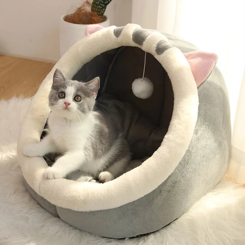 Niche douillette grise pour chat avec jouet pompon