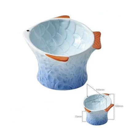 Bol en céramique pour chat, couleurs rose et bleu, favorisant une alimentation saine et une digestion optimale.