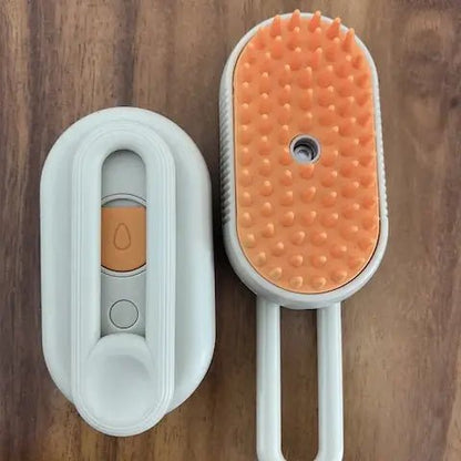 Brosse à vapeur 3-en-1 pour chat isolée sur fond blanc, montrant son design ergonomique et ses couleurs orange et blanc
